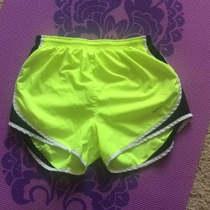 Highlighter yellow Nike running shorts